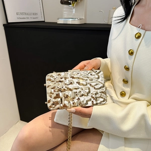 Chic gold acrylic clutch bag with ice crack pattern and metallic chain strap for women