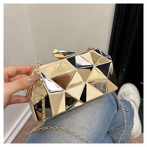 Detail of luxury geometric晚宴手拿包 showing gold and silver metallic texture and chain