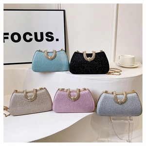 Five sparkling sequin evening bags in assorted colors with gold metal U-shaped handles
