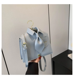 Detailed view of creative shirt-shaped PU leather shoulder bag in light blue with gold hooks