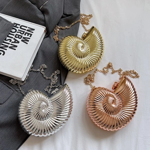 Metallic conch shell clutch bag with spiral texture and chain strap in three colors