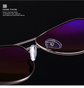 Macro shot of comfortable silicone nose pads on classic polarized metal aviator sunglasses