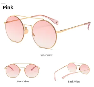 Detailsicht der runden Sonnenbrille mit rosa Farbverlauf und goldenem Metallgestell