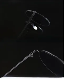 Detailansicht der hochwertigen Scharniere und UV-Schutzgläser dieser runden Sonnenbrille