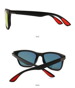 Detail view of polarized pilot sunglasses with matte black frames and red non-slip grips