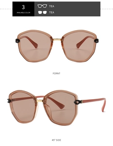 Detail of geometric oversized tea-colored sunglasses with unique cutout temple hinges