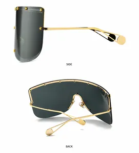 Detailed side and back view of shield sunglasses with gold star rivets and metal temples
