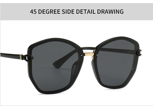 Detail view of large frame sunglasses showing the 45-degree side angle and golden hinges