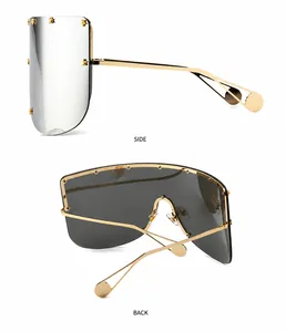Side and back view of oversized mask sunglasses with gold star rivets and silver lenses