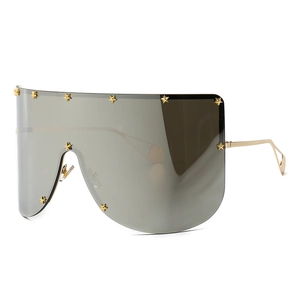 Oversized mask shield sunglasses with grey gradient lenses and gold star rivets