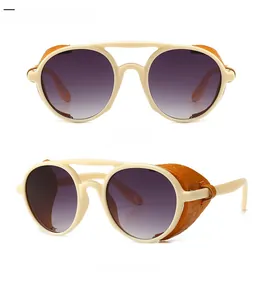 Detail view of steampunk sunglasses with cream frames and textured side shields