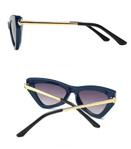Detailed side and back views of narrow navy butterfly sunglasses with gold temples