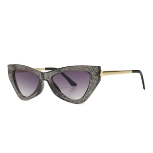 Modern cat-eye sunglasses with grey glitter frame, purple gradient lenses and gold temples