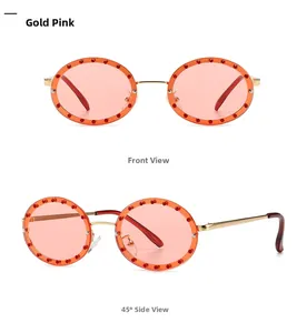 Detailed front and 45-degree side views of gold pink round sunglasses with rhinestones