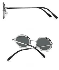 Side and back view of retro round sunglasses with silver frames and red rhinestones