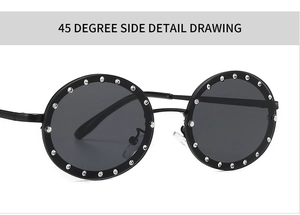 Macro shot of round black sunglasses with crystal rhinestones on the frame at 45 degree angle