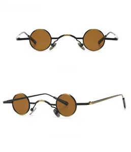 Front and side views of steampunk round sunglasses with gold tea lenses and metal frames