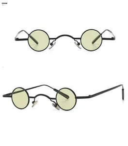 Front and 45-degree side views of black round steampunk sunglasses with light yellow lenses