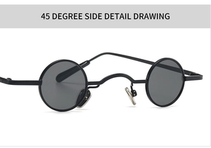 Detail view of steampunk round metal sunglasses with matte black frames and nose pads