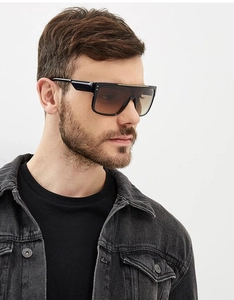 Side view of oversized flat top shield sunglasses with gradient lenses and gold metal trim