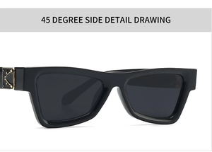 Macro view of butterfly sunglasses with black frame and golden textured metal hinge detail