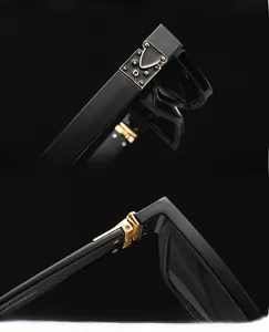 Close-up of black acetate frame with silver triangle metal rivets and reinforced hinges