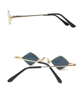 Detail view of round sunglasses showing side and back angles with golden metal rope temples