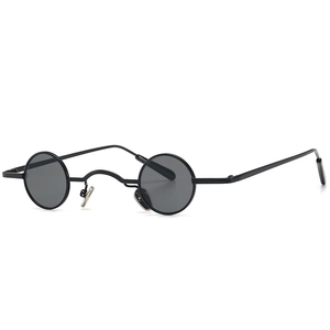 Retro steampunk sunglasses with matte black metal frame and small round lenses for fashion