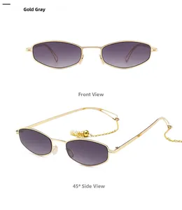 Détail de lunettes de soleil rondes avec chaîne dorée et perles, verres dégradés
