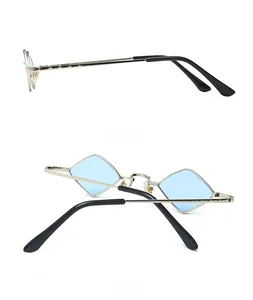 Detail view of silver metal sunglasses with blue diamond lenses from side and back angles