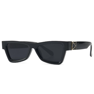 Retro cat-eye rectangular sunglasses with gold hollow pattern on temples in black finish
