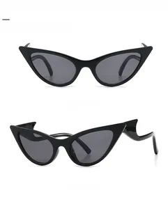 Detailed front and side view of black cat-eye sunglasses with wavy temple design
