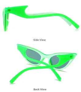 Detail view of neon green cat-eye sunglasses with unique wavy temples and black lenses