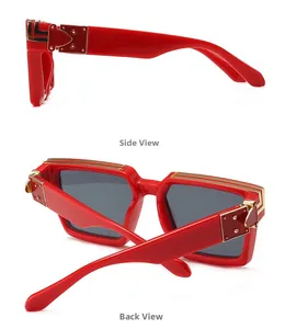 Détails de lunettes de soleil carrées rouges avec charnières dorées et branches larges