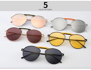 Vue détaillée de lunettes de soleil aviateur en cinq couleurs avec monture en métal et pont