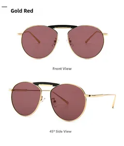 Vues de face et de profil de lunettes de soleil vintage dorées avec verres rouges