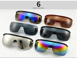 Flat lay of six color options for oversized frameless shield sunglasses with mirrored lenses
