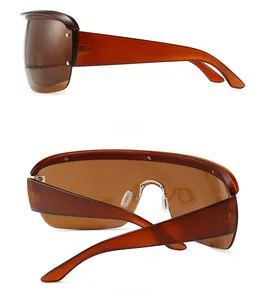 Side and back view of oversized amber sunglasses with wide temples and integrated lens