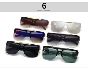 Flat lay of flat top shield sunglasses in six colors with metal bridge detail