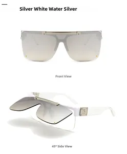 Close-up of silver mirror flip-up sunglasses with white frames and metal accents
