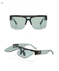 Modern retro flip-up mask sunglasses featuring black gunmetal frame and light green lenses