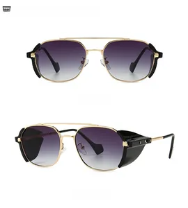 Detail view of gold pilot sunglasses with vintage side shields and gradient lenses