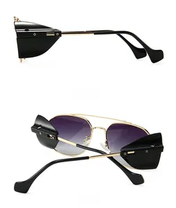 Detail view of steampunk gold sunglasses with purple gradient lenses and side shields
