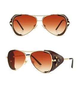 Front and 45-degree angle views of gold steampunk aviator sunglasses with leather shields