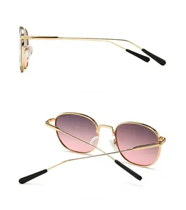 Side and back view of retro round metal sunglasses with pink gradient lenses