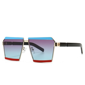 Modern oversized geometric sunglasses with gold metal frame and gradient colorful lenses