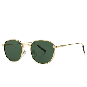 Modern vintage round metal sunglasses with gold frames and dark green lenses