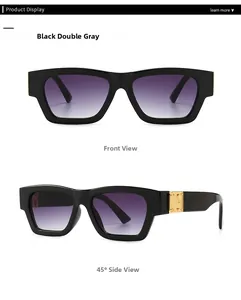 Detail view of large square black sunglasses with purple gradient lenses and gold accents