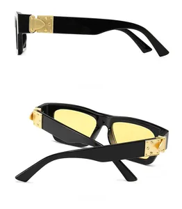 Side and back view of retro oversized sunglasses with bold black frame and gold hinges