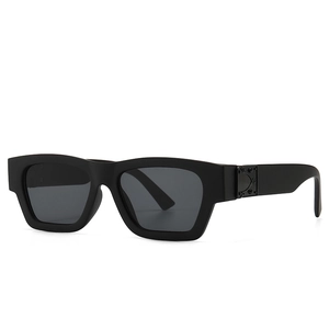 Modern oversized square sunglasses with matte black frames and silver metal D-shaped detail